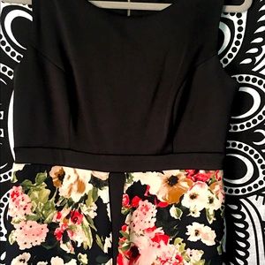 Dress 👗 black top and the skirt is flowers